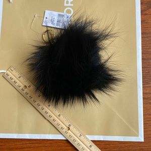 NWT. MK charms Fur